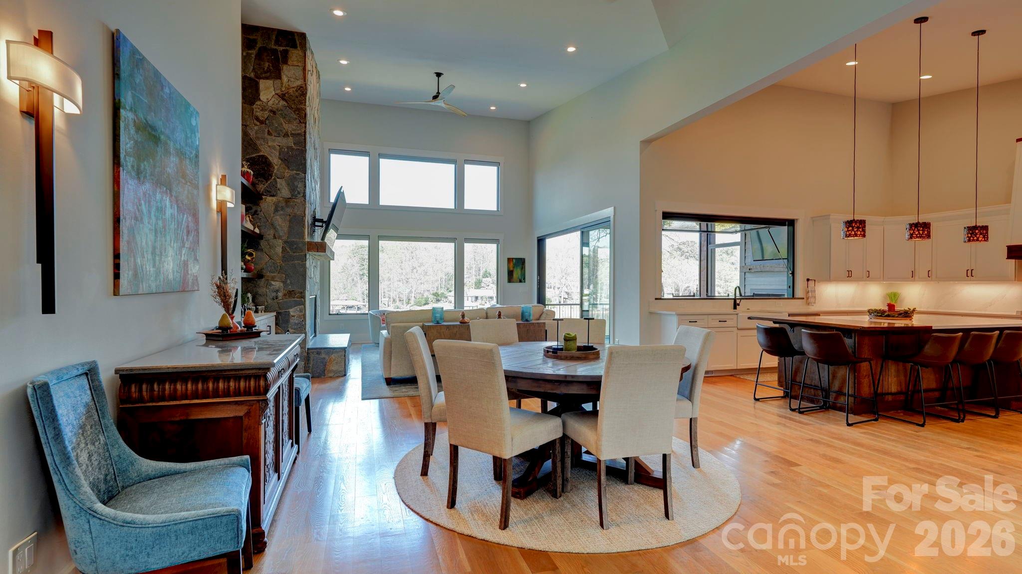 644 Normandy Road Mooresville, NC 28117 - Photo 14 of 32 a view of a dining room with furniture window and wooden floor