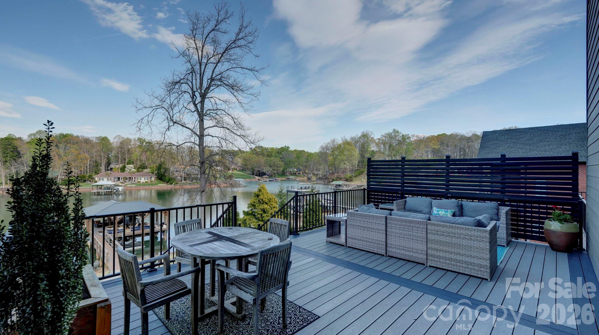644 Normandy Road Mooresville, NC 28117 - Photo 19 of 32 a view of a chairs and table on the wooden floor