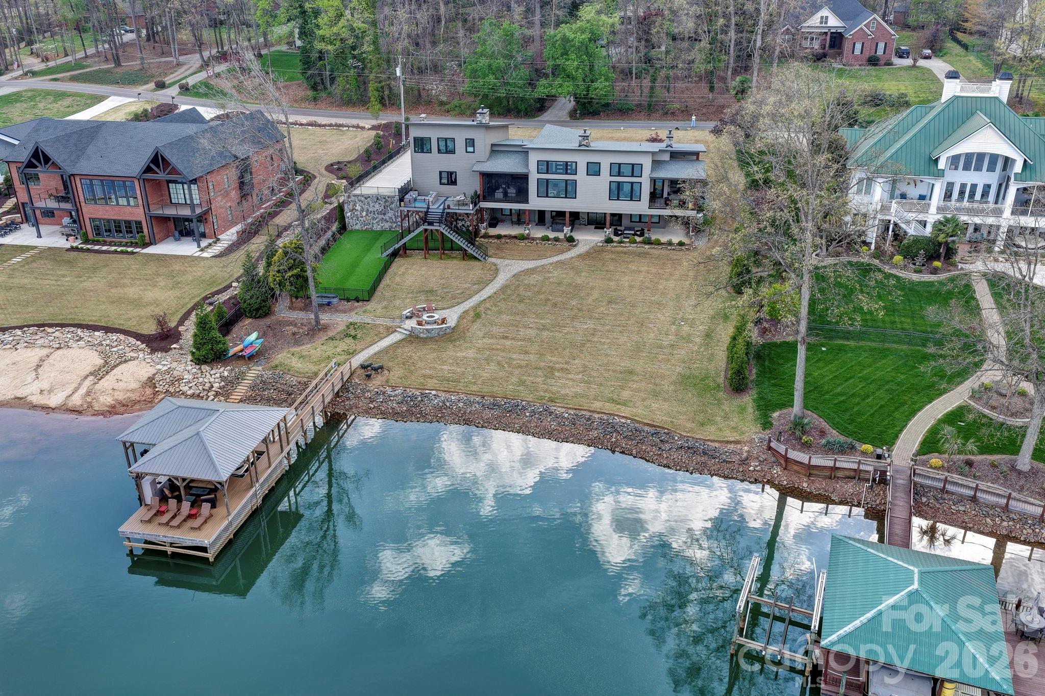 644 Normandy Road Mooresville, NC 28117 - Photo 20 of 32 an aerial view of a house with swimming pool patio and outdoor seating