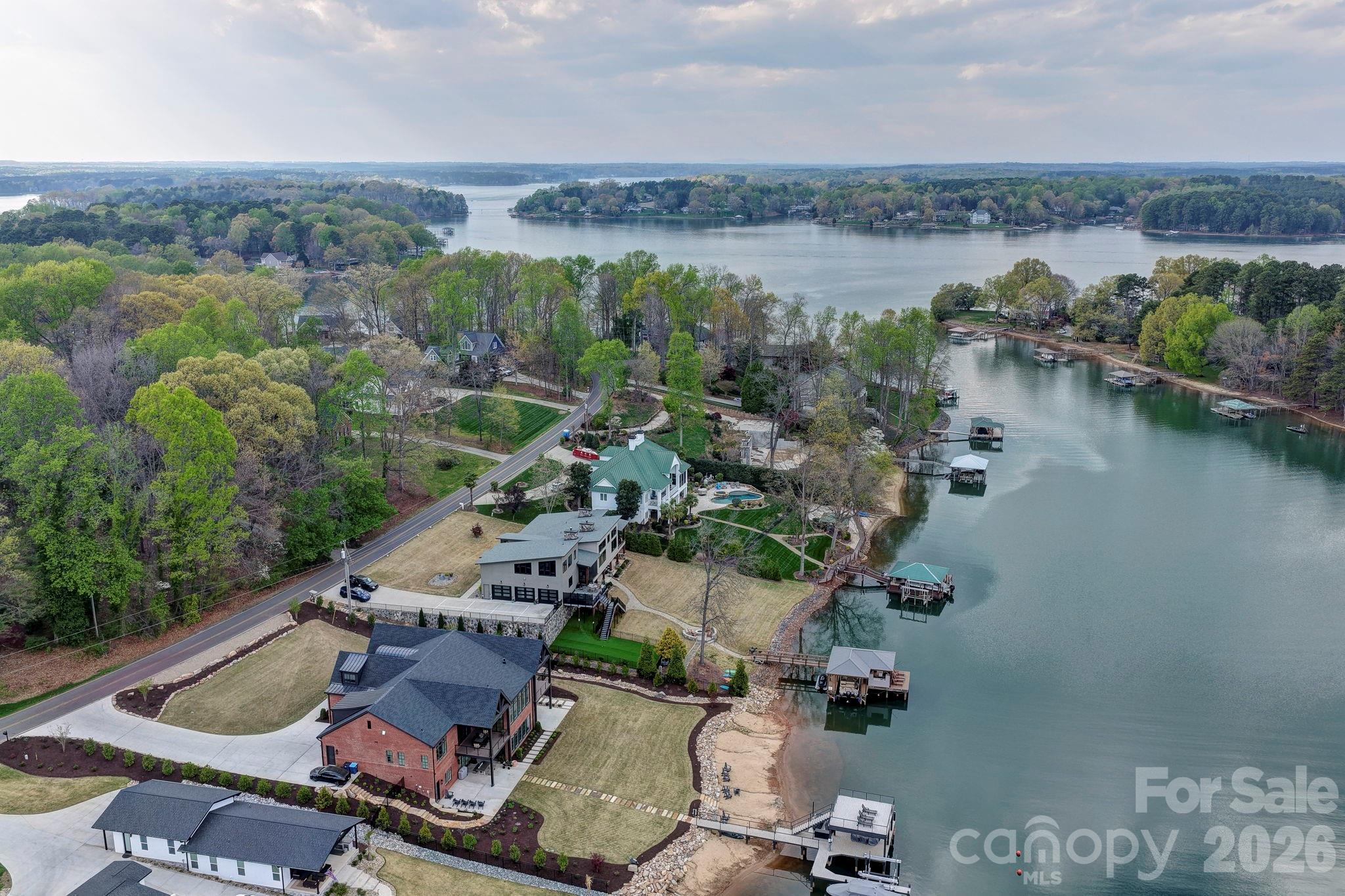 644 Normandy Road Mooresville, NC 28117 - Photo 22 of 32 an aerial view of a house with outdoor space and lake view
