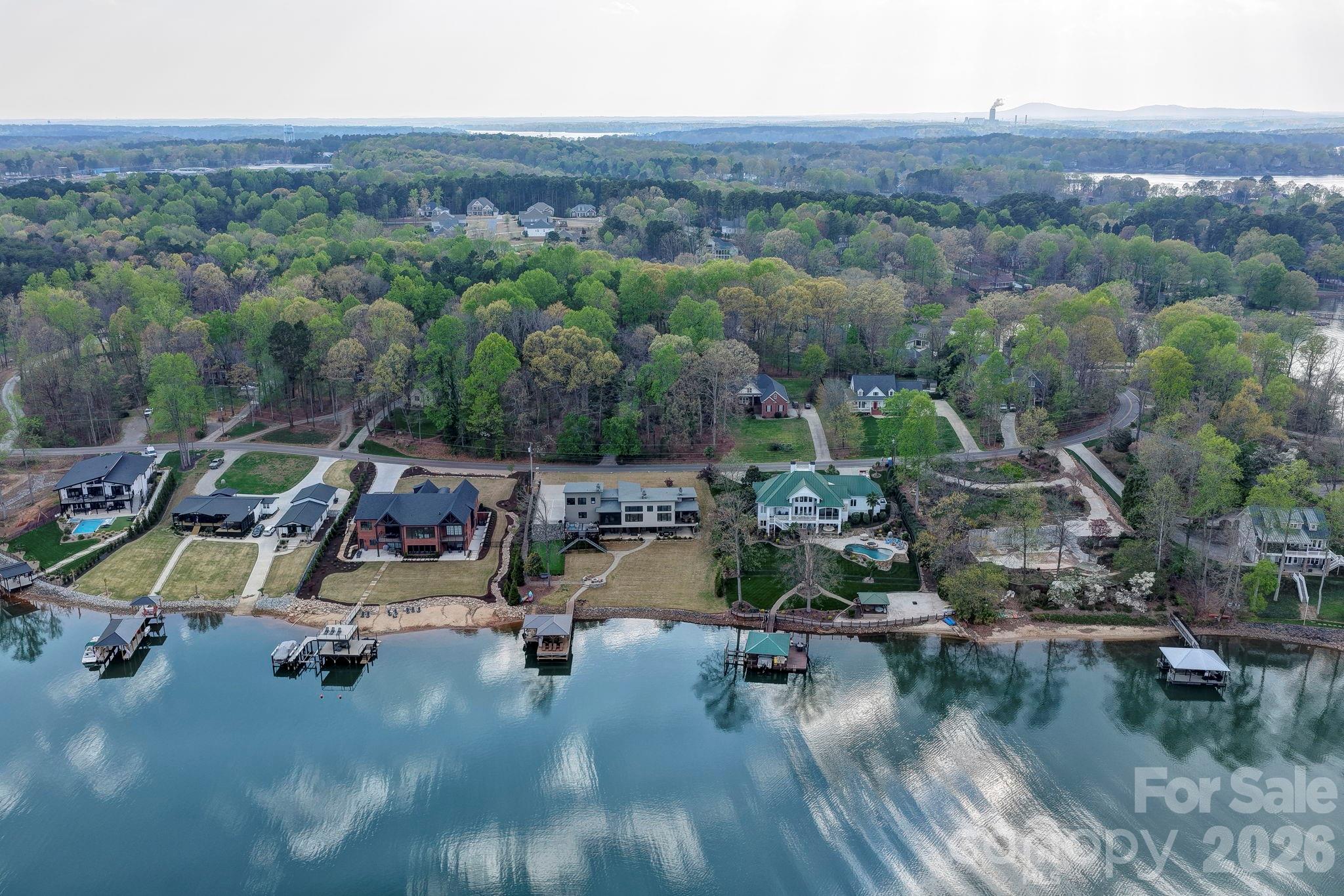 644 Normandy Road Mooresville, NC 28117 - Photo 25 of 32 a view of a lake with houses