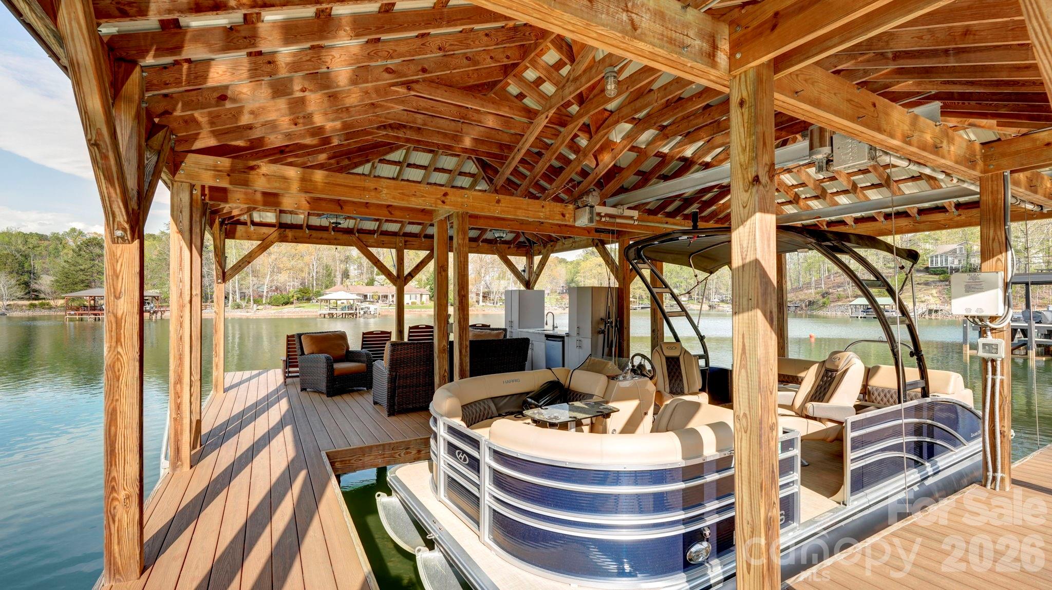 644 Normandy Road Mooresville, NC 28117 - Photo 29 of 32 a balcony with couch and chairs