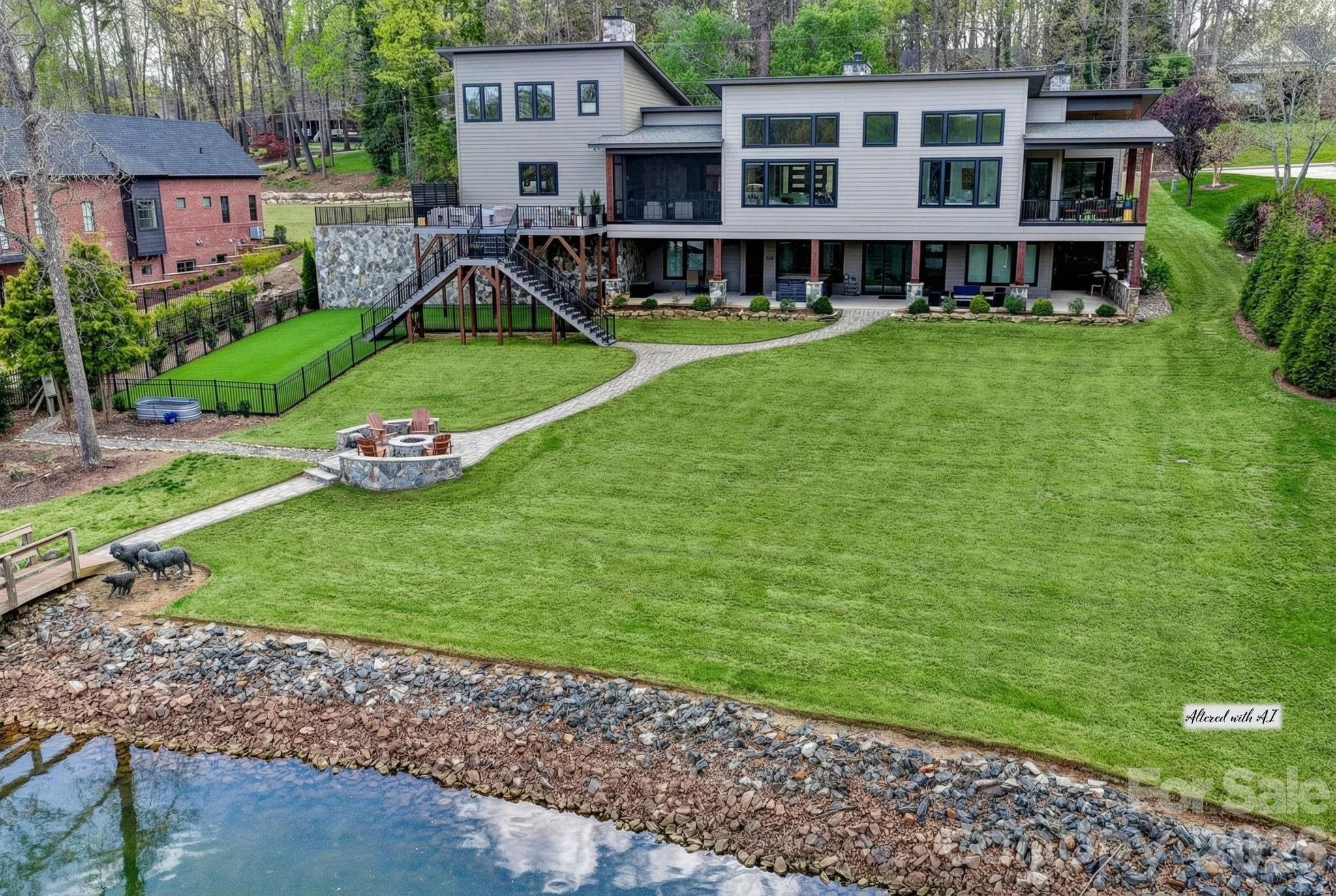 644 Normandy Road Mooresville, NC 28117 - Photo 6 of 32 a view of a house with backyard and garden