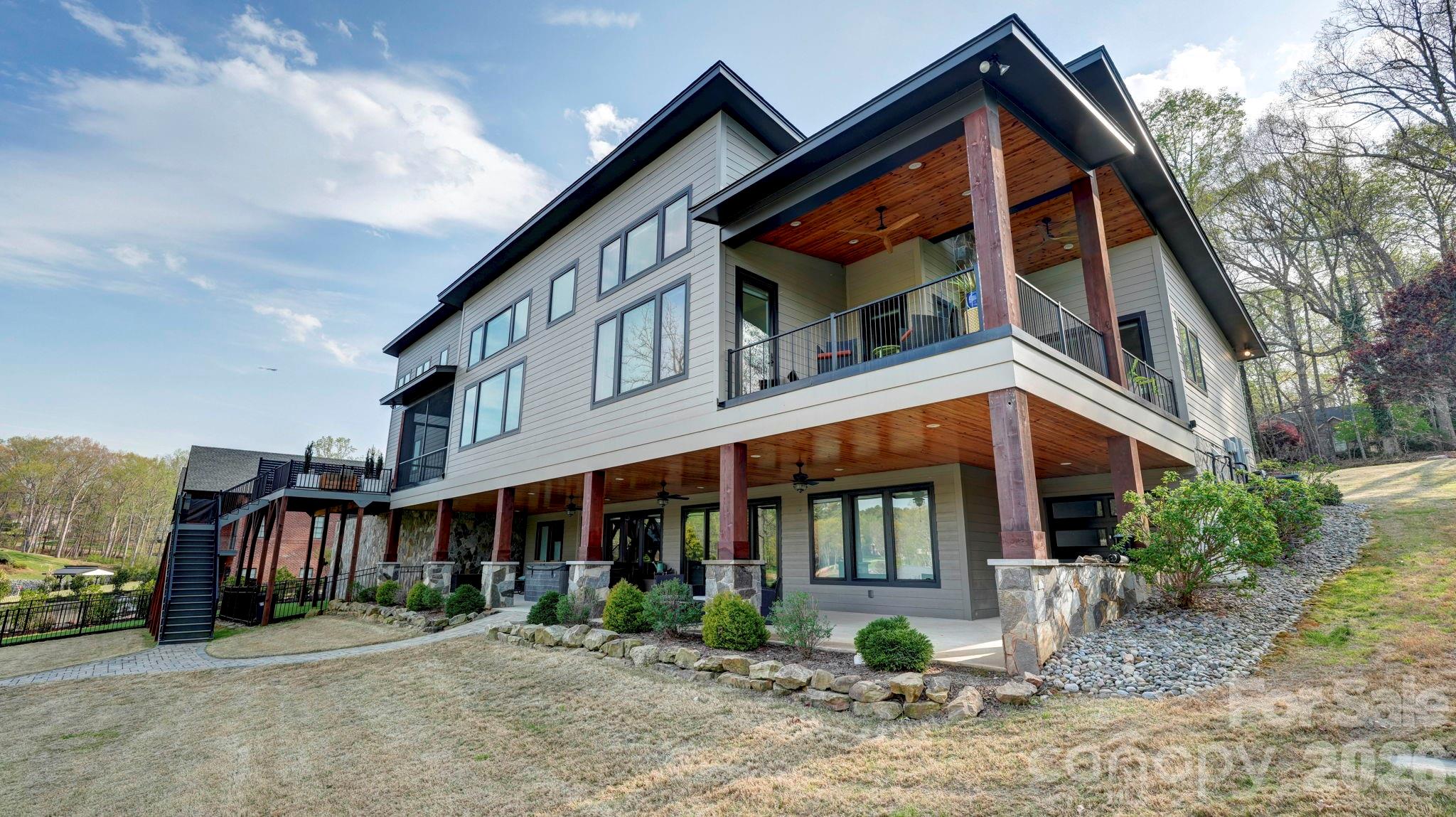 644 Normandy Road Mooresville, NC 28117 - Photo 7 of 32 a view of a house with a yard
