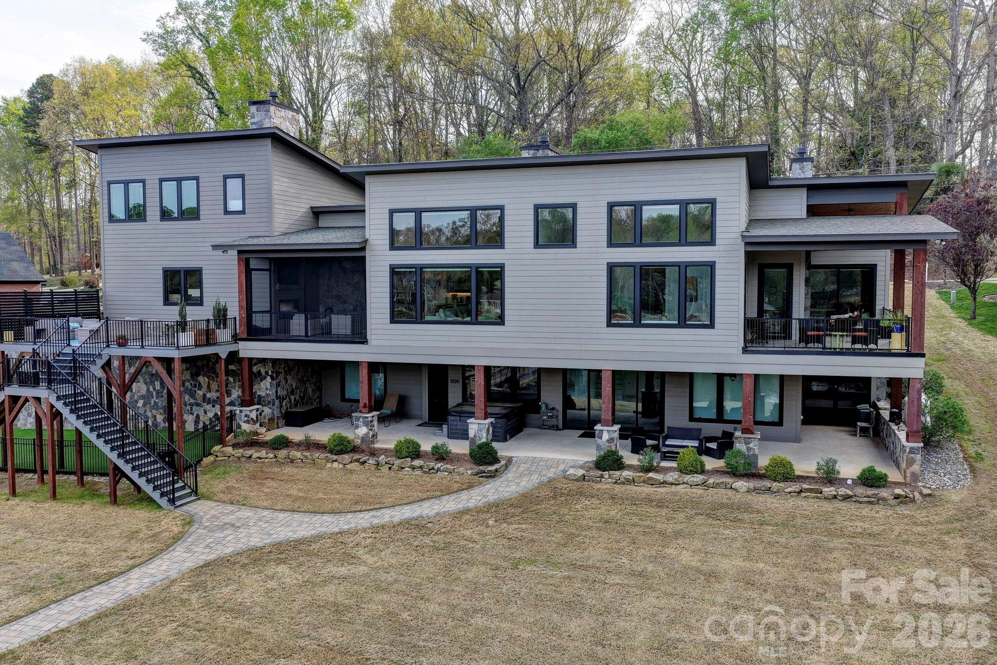 644 Normandy Road Mooresville, NC 28117 - Photo 8 of 32 a front view of a house with yard and tree s