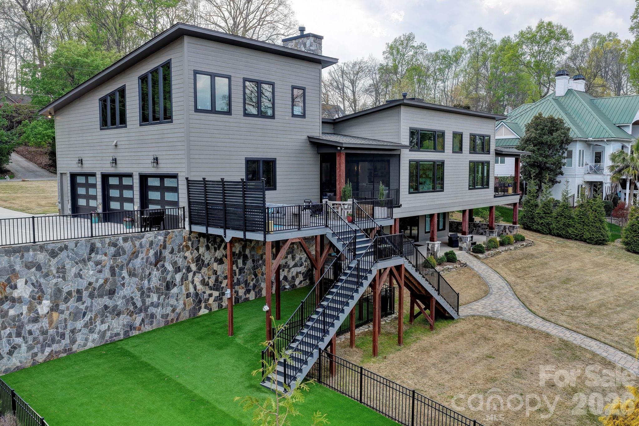 644 Normandy Road Mooresville, NC 28117 - Photo 9 of 32 a view of a house with backyard and sitting area