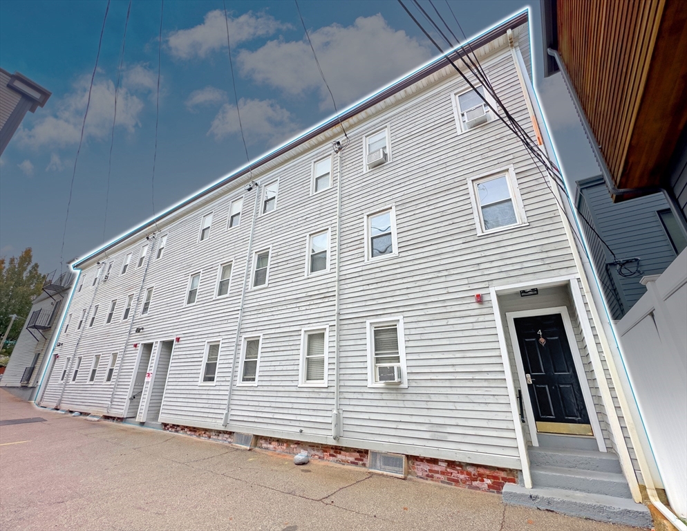 1-4 Schrepel Place Boston, MA 02127 - Photo 1 of 13 a view of a house with a stairs