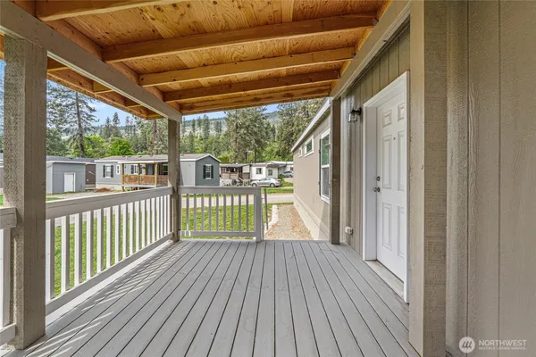 a view of porch with wooden floor in outdoor space