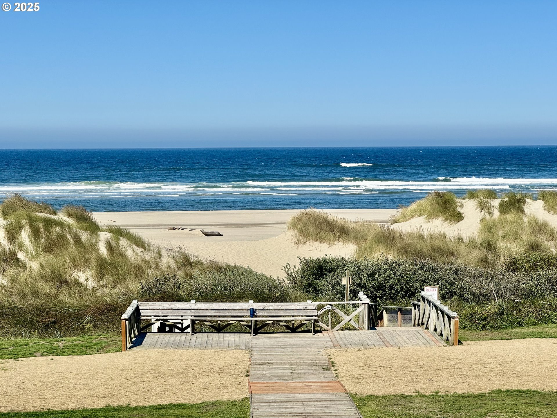 88416 1st Avenue, Unit 201 Florence, OR 97439 - Photo 12 of 29 a view of a ocean from a yard