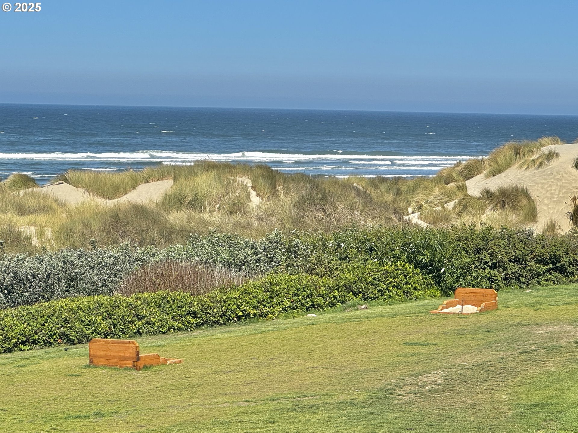 88416 1st Avenue, Unit 201 Florence, OR 97439 - Photo 15 of 29 a view of an ocean and beach