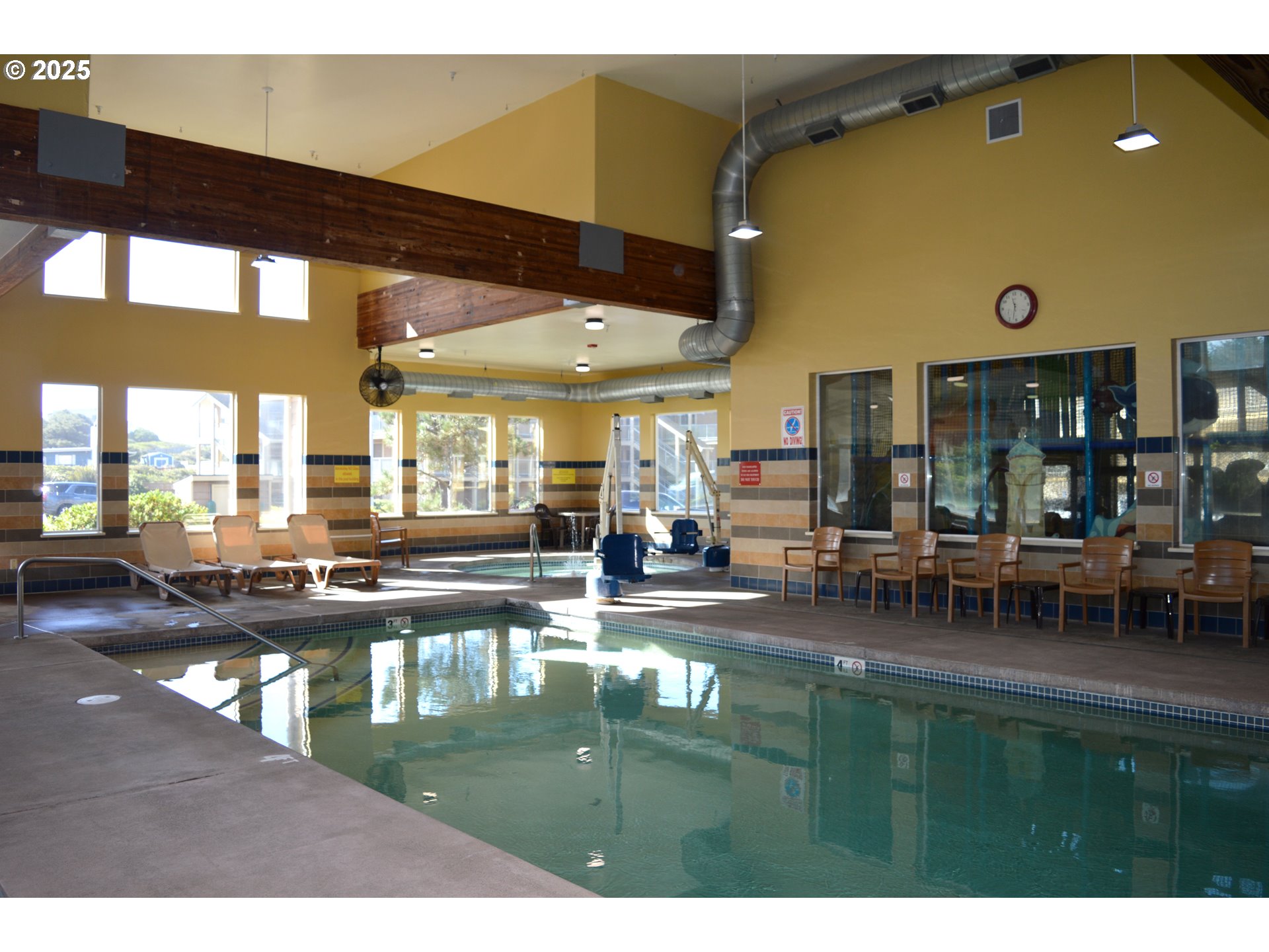 88416 1st Avenue, Unit 201 Florence, OR 97439 - Photo 22 of 29 a swimming pool view with a outdoor seating