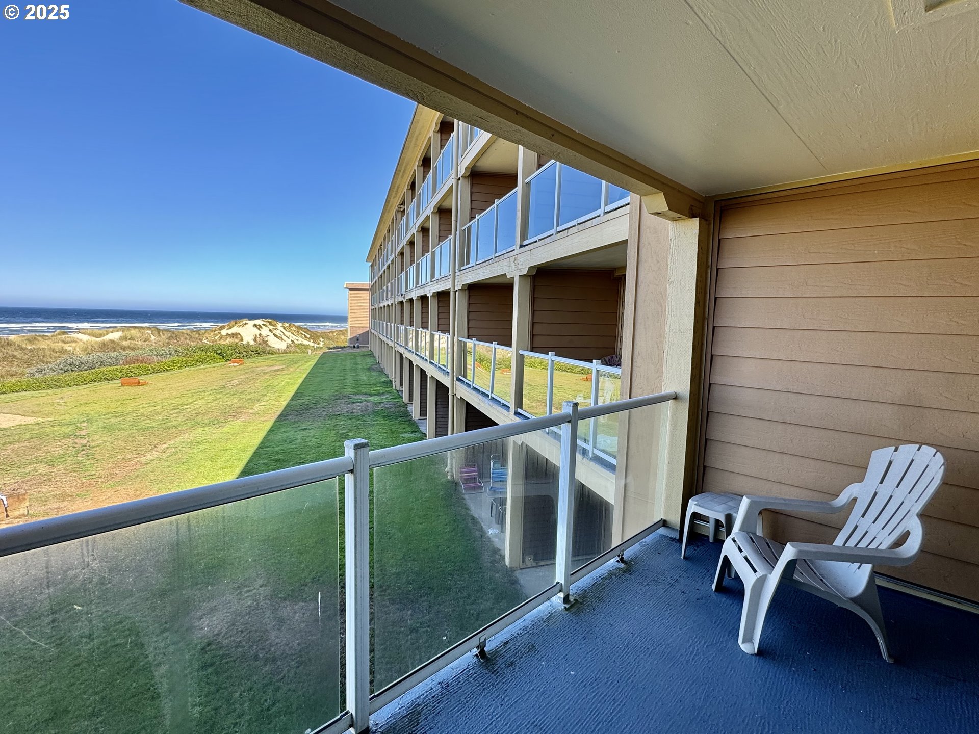 88416 1st Avenue, Unit 201 Florence, OR 97439 - Photo 9 of 29 a house with wooden walls