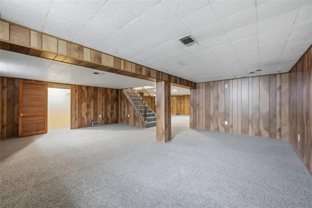 an empty room with a bathroom