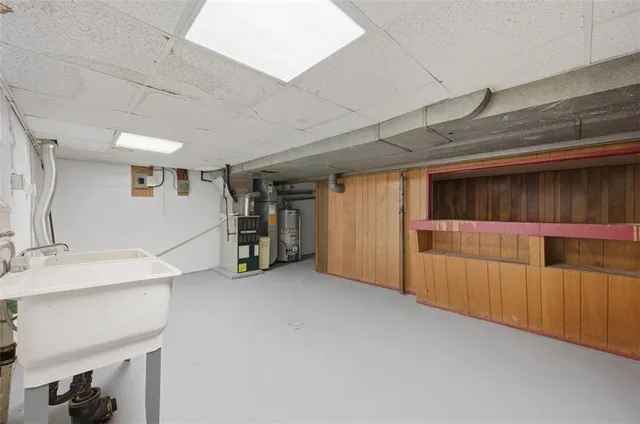 a view of an empty room with stairs