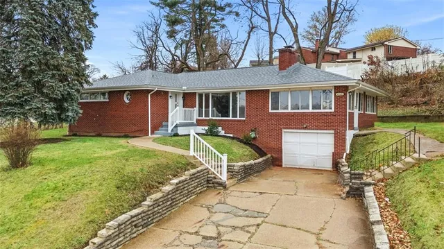 a house view with a garden space