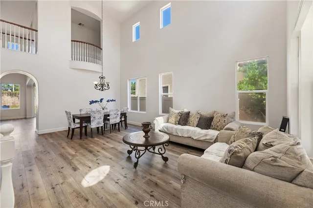 a living room with furniture and a table