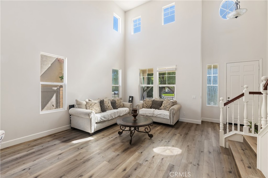 31244 Locust Court Temecula, CA 92592 - Photo 6 of 30 a living room with furniture and a wooden floor