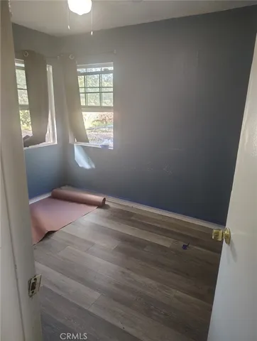 an empty room with windows