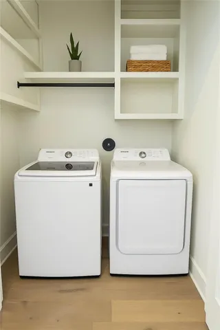 a utility room with dryer and washer