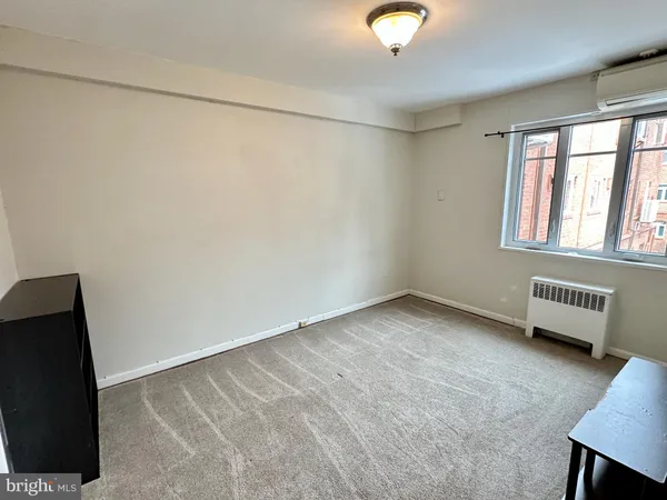 $2,300 | 10413 Montrose Avenue, Unit M201, Bethesda, MD 20814