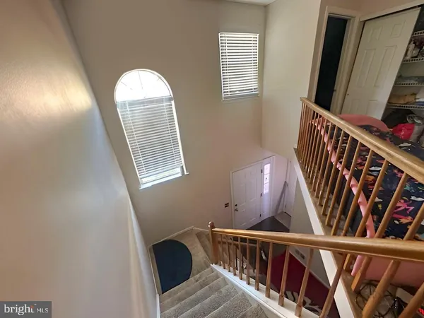 a view of stairs and with wooden floor