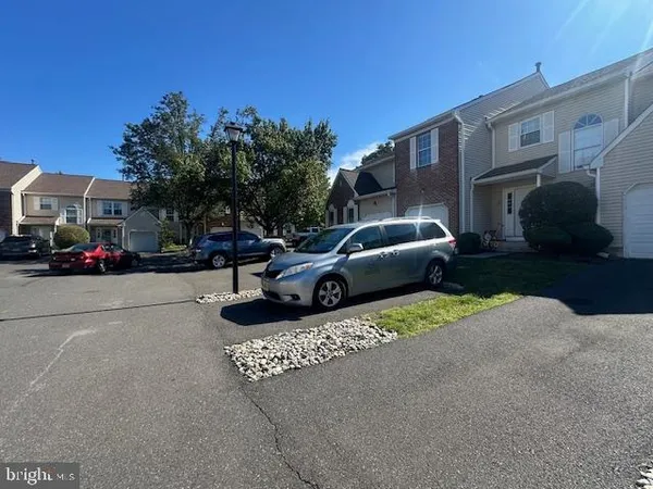 a car parked in front of a house