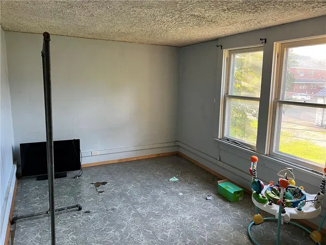 a room with toys and windows