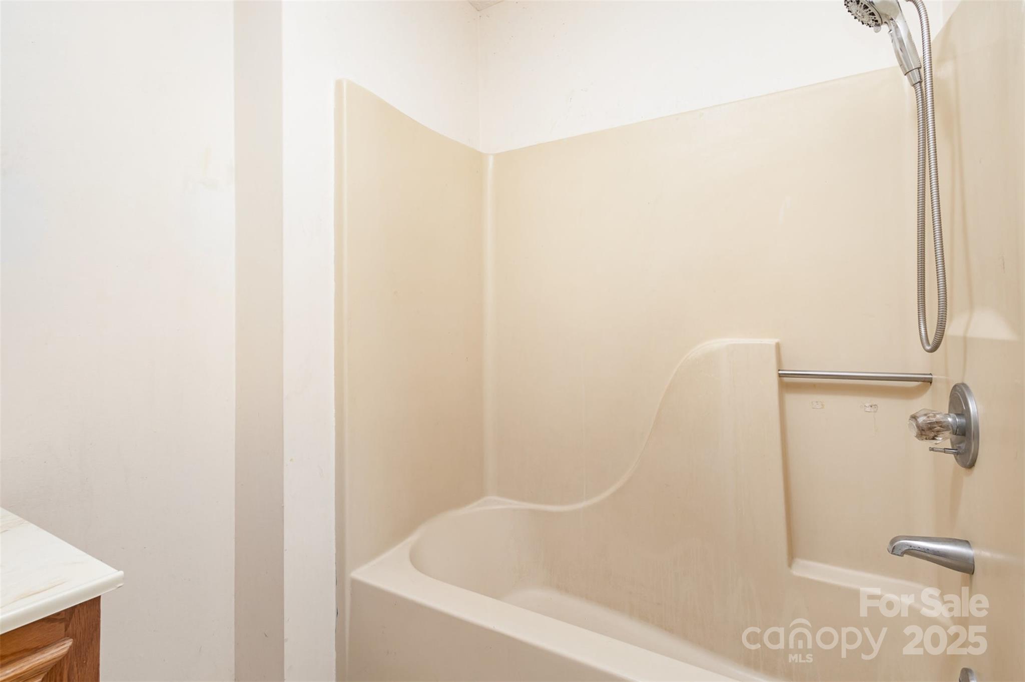 2888 Robinson Road Newton, NC 28658 - Photo 18 of 26 a bathroom with a bathtub
