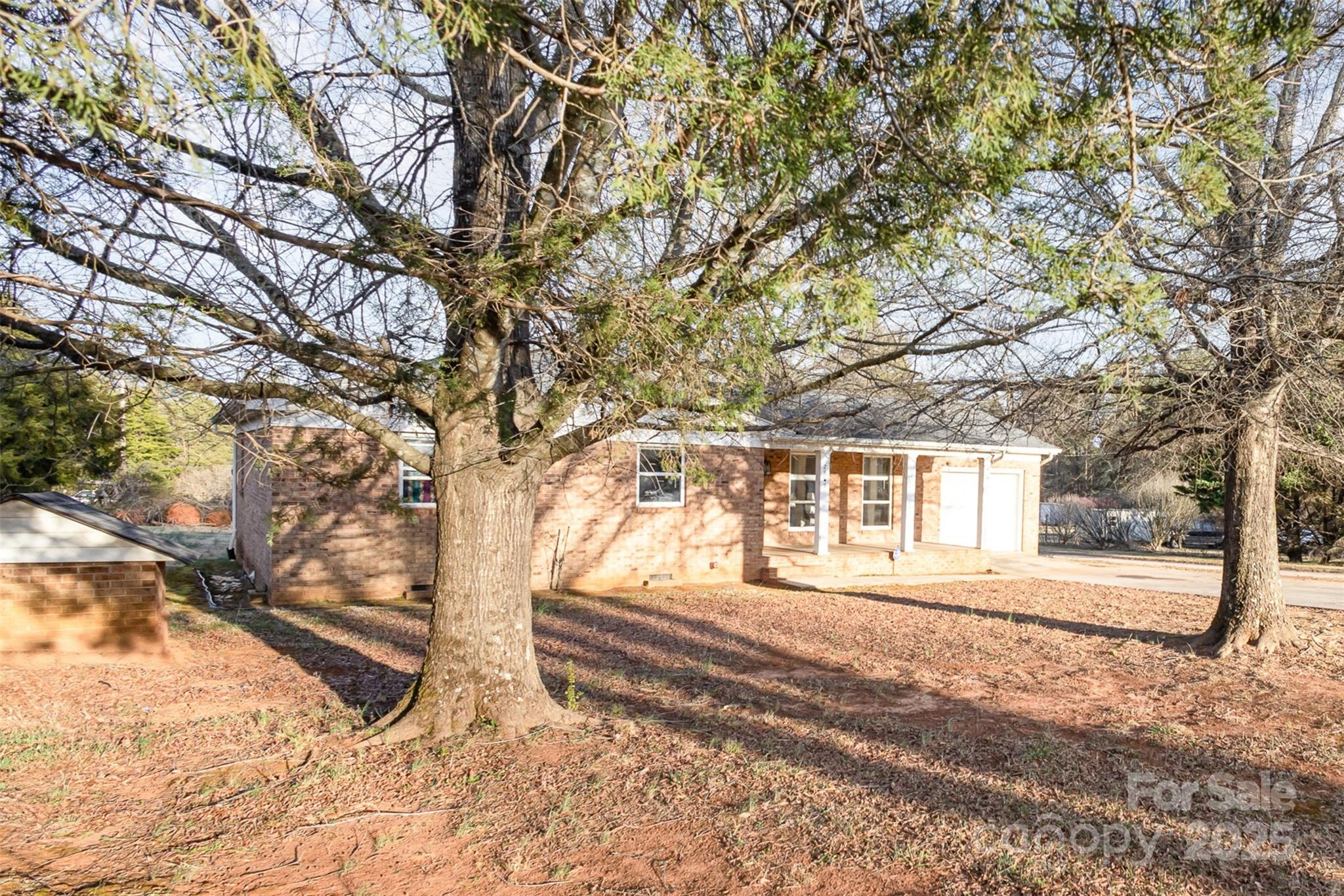 2888 Robinson Road Newton, NC 28658 - Photo 2 of 26 a view of a house with a yard