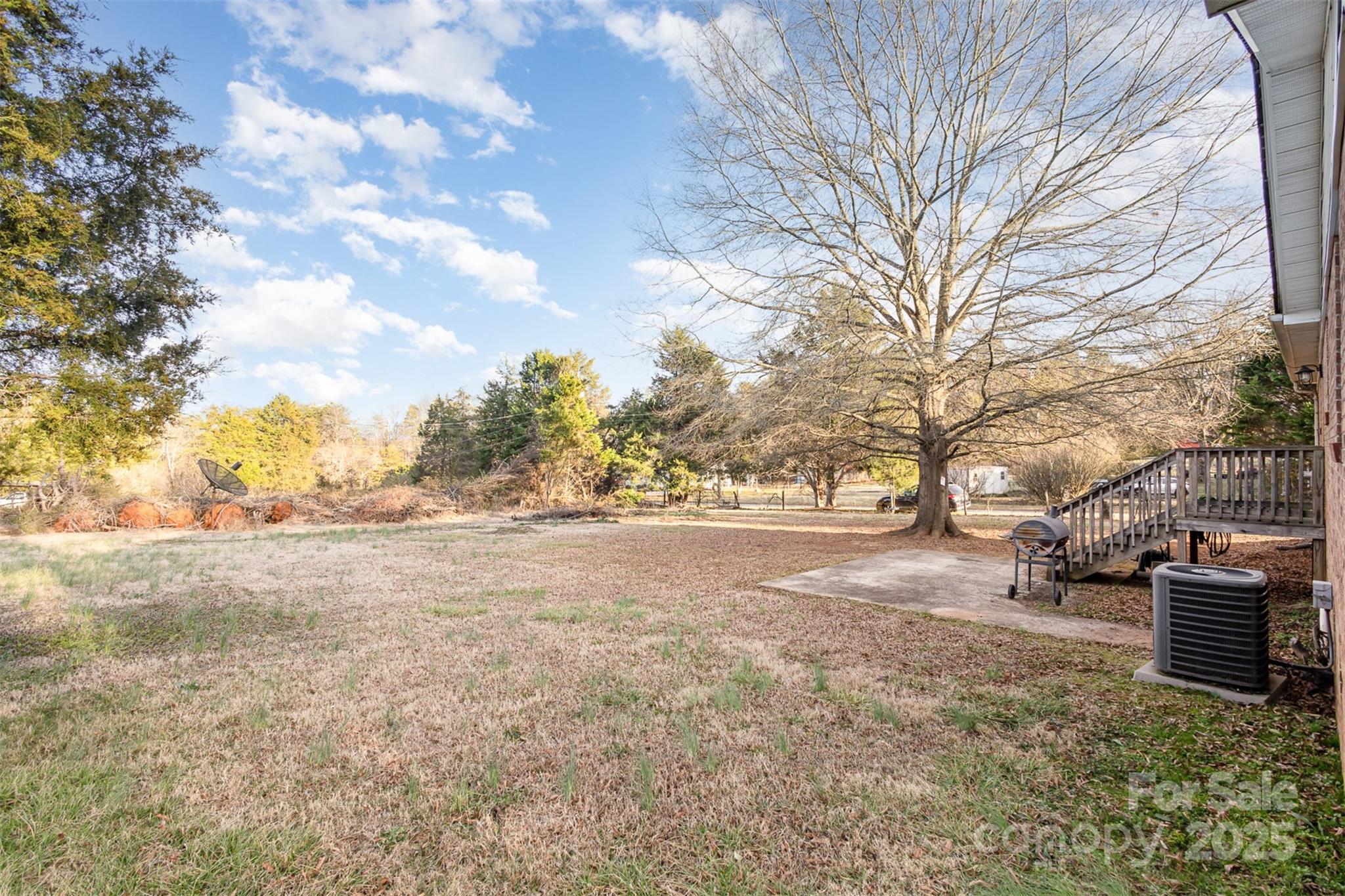 2888 Robinson Road Newton, NC 28658 - Photo 24 of 26 a view of dirt yard with a tree