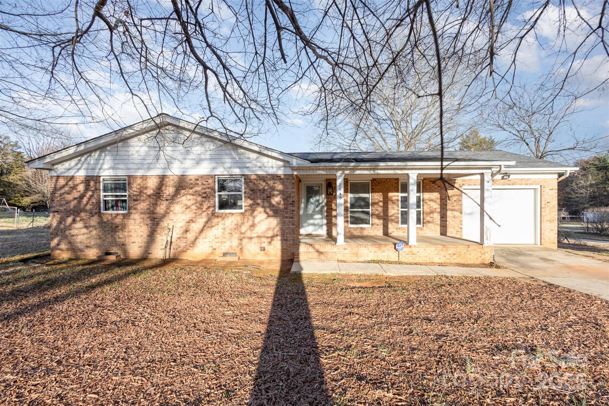 2888 Robinson Road Newton, NC 28658 - Photo 4 of 26 a view of a yard with an outdoor space