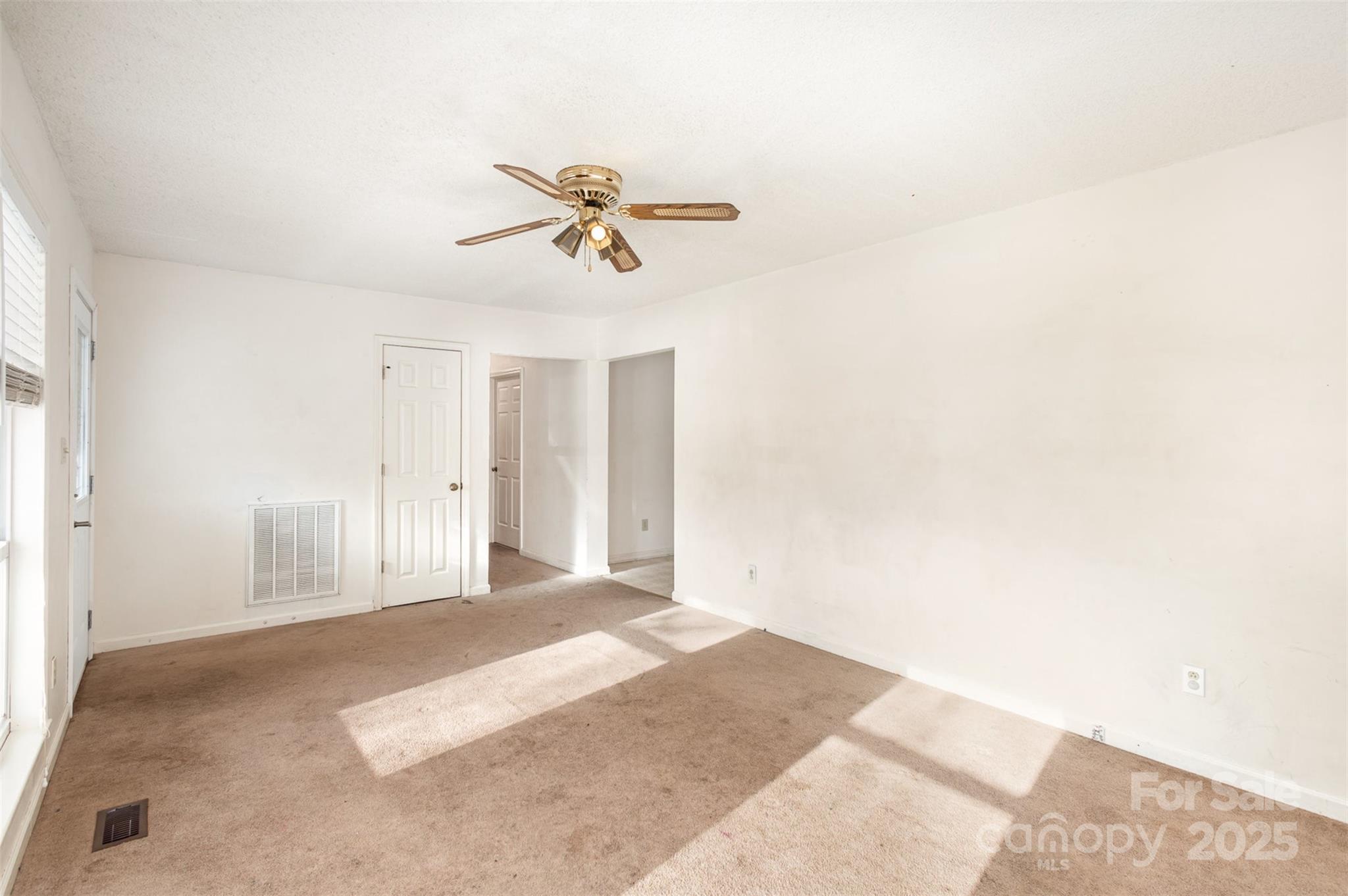 2888 Robinson Road Newton, NC 28658 - Photo 8 of 26 a view of a big room with carpet