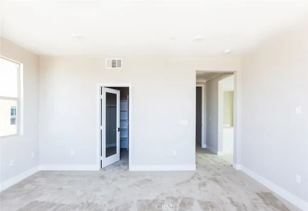 an empty room with closet