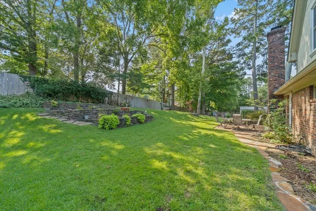 a view of a backyard with a garden