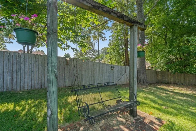 a view of a backyard with a potted plant