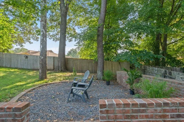 a view of a bench in a garden