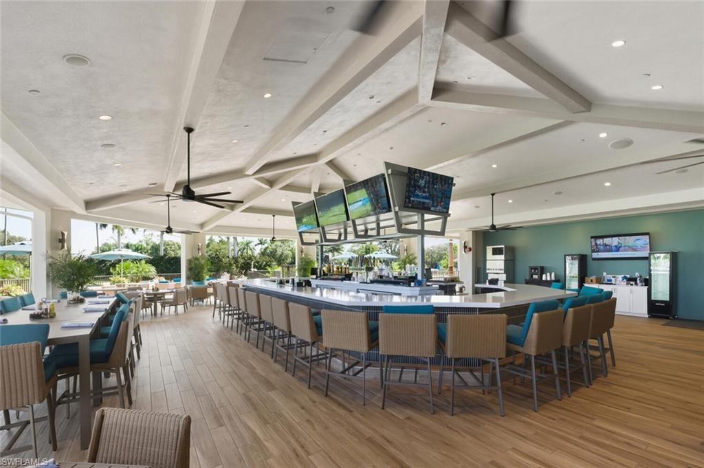 209 Countryside Drive Naples, FL 34104 - Photo 40 of 50 Bar area featuring ceiling fan, recessed lighting, and beam ceiling