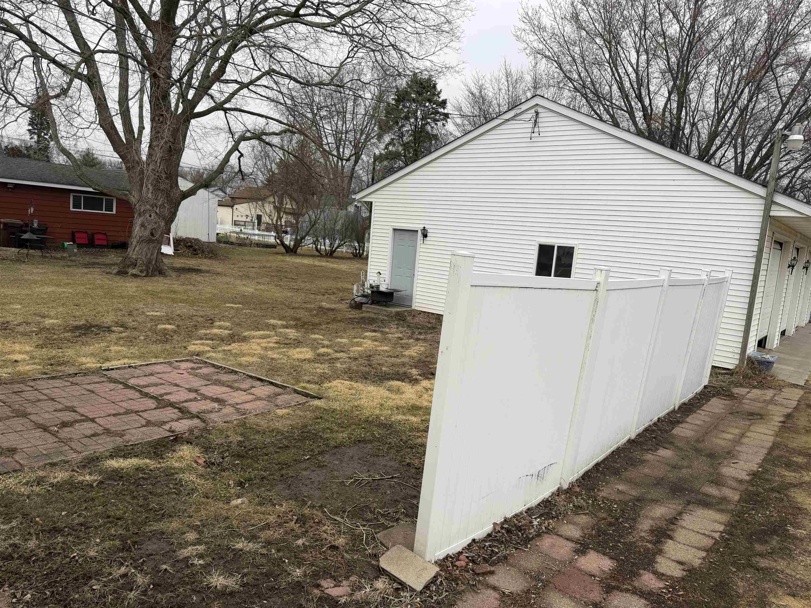 509 North Walnut Street Byron, IL 61010 - Photo 6 of 15 a view of a white house with a yard