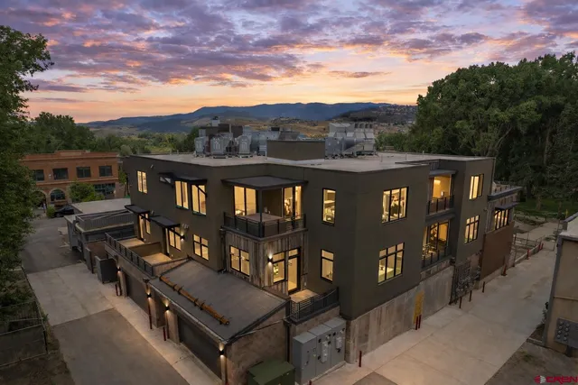 a view of a chairs and table in a terrace