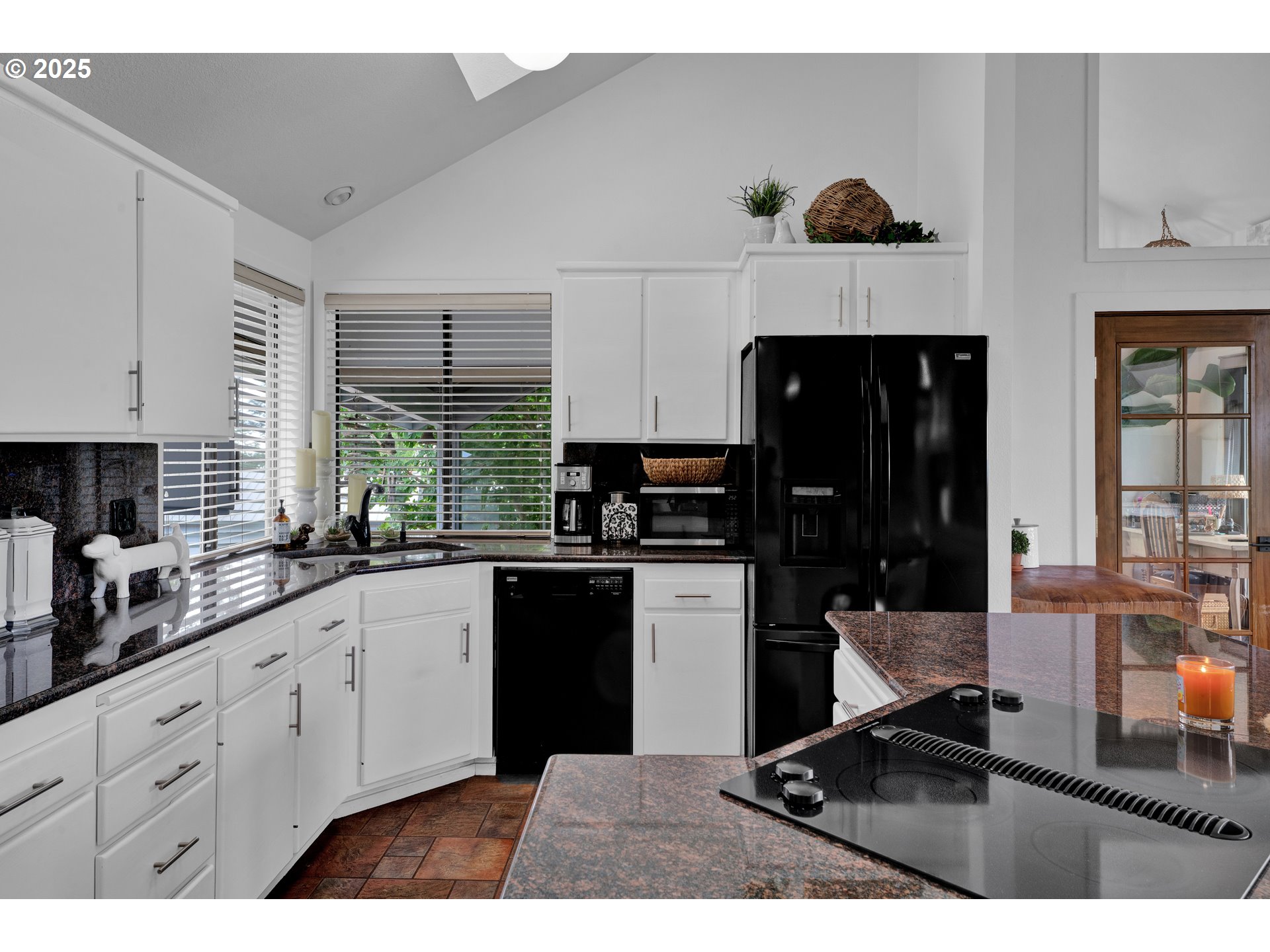 88616 Ocean View Lane Florence, OR 97439 - Photo 15 of 47 a kitchen with a sink a stove and cabinets