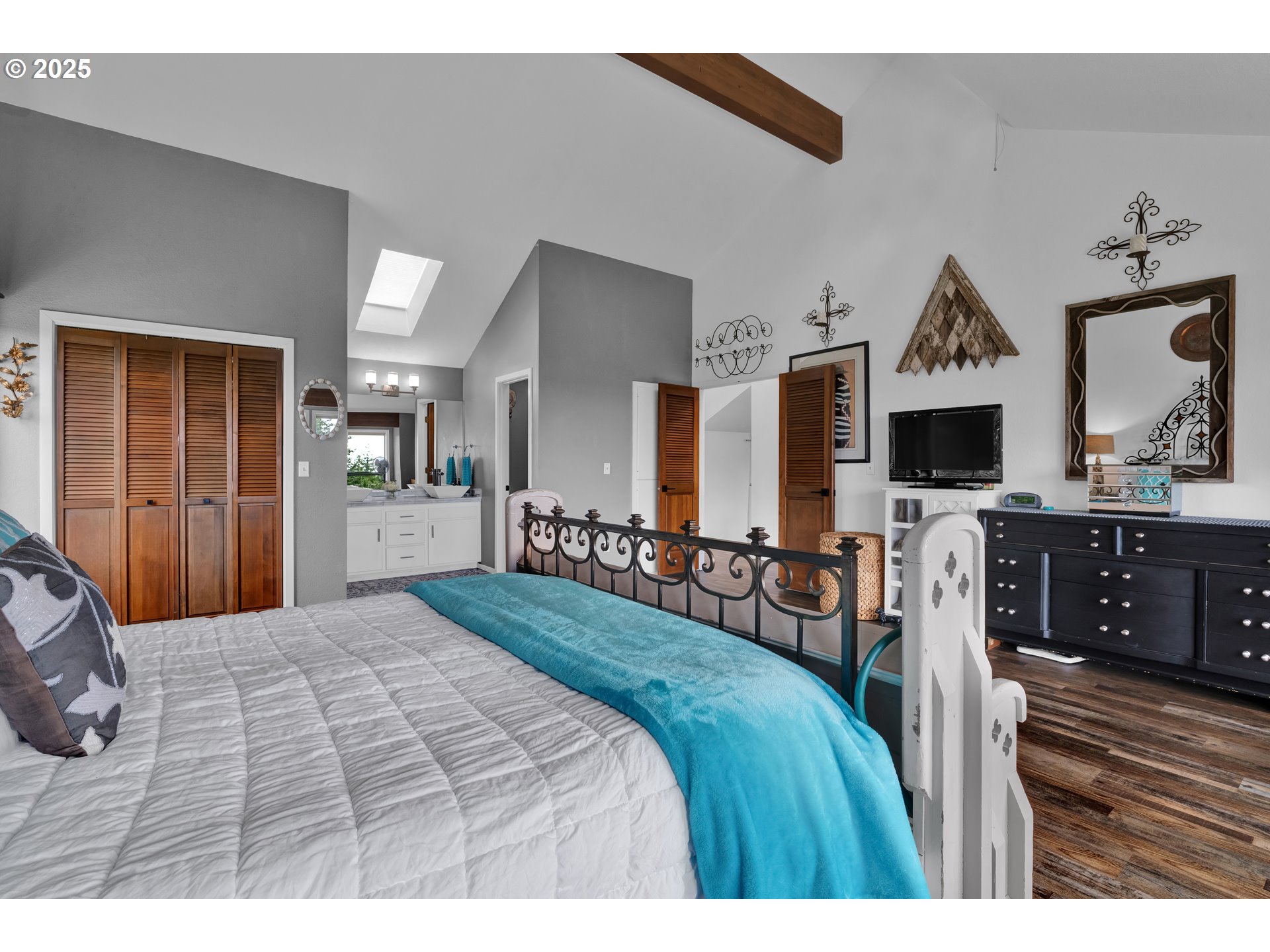 88616 Ocean View Lane Florence, OR 97439 - Photo 24 of 47 a bedroom with a bed a flat screen tv and dresser