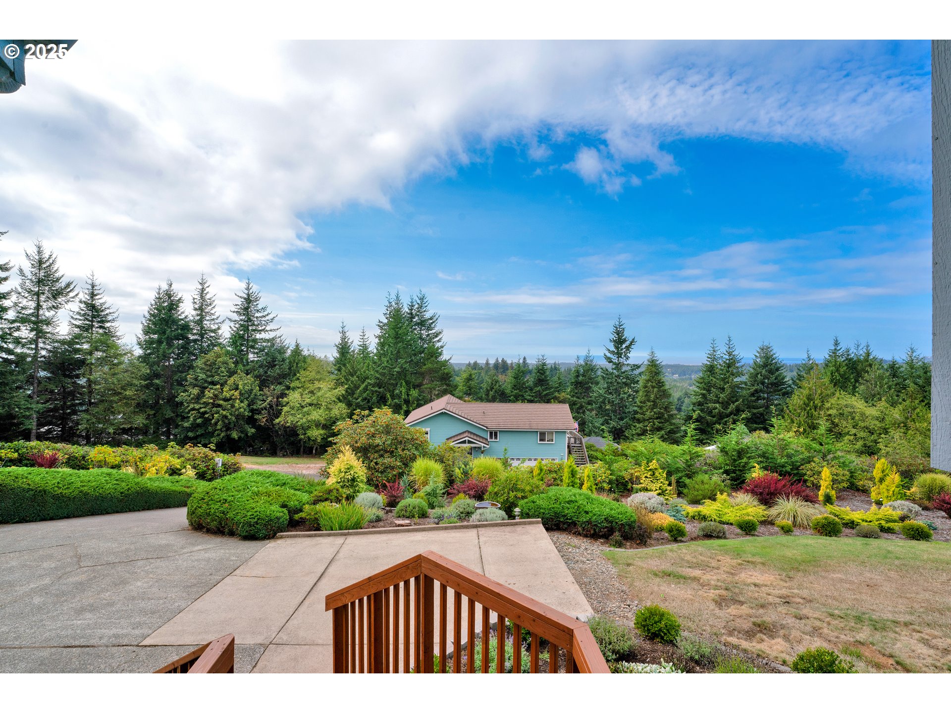 88616 Ocean View Lane Florence, OR 97439 - Photo 35 of 47 an aerial view of a house with a garden