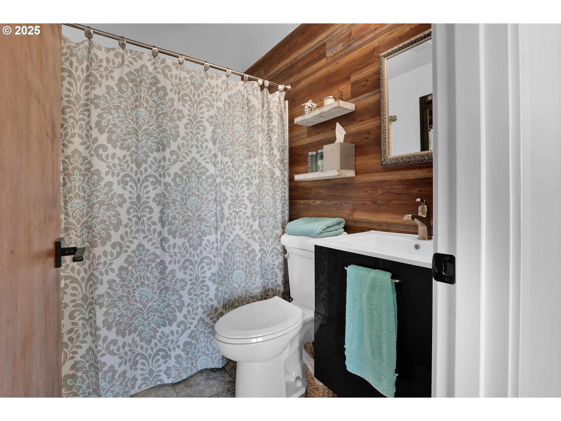 88616 Ocean View Lane Florence, OR 97439 - Photo 42 of 47 a bathroom with a toilet sink and shower