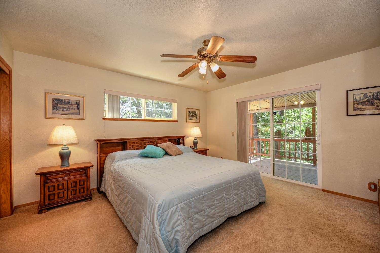 23998 Stable Road Sonora, CA 95370 - Photo 15 of 41 a bedroom with a bed dresser and a window