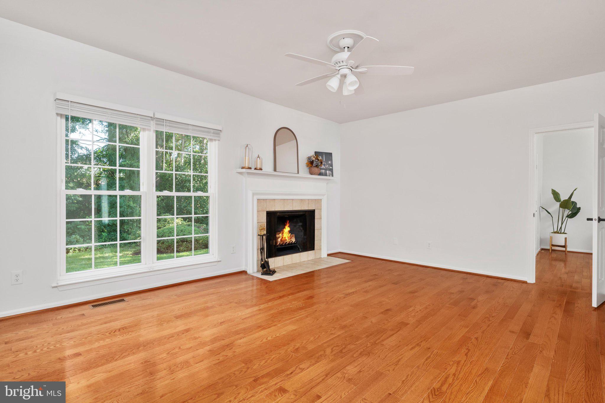 8550 Yoder Street Manassas, VA 20110 - Photo 10 of 39 Family room with wood burning fireplace