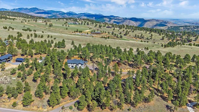 a view of a city with mountain