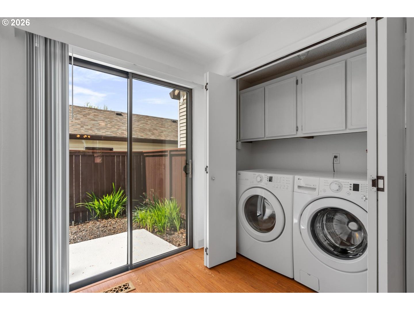 5792 Southwest 204th Place Beaverton, OR 97078 - Photo 13 of 33 a utility room with dryer and washer