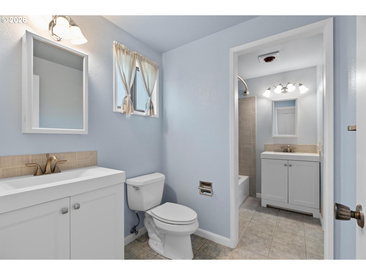 5792 Southwest 204th Place Beaverton, OR 97078 - Photo 22 of 33 a bathroom with a toilet sink vanity granite and mirror