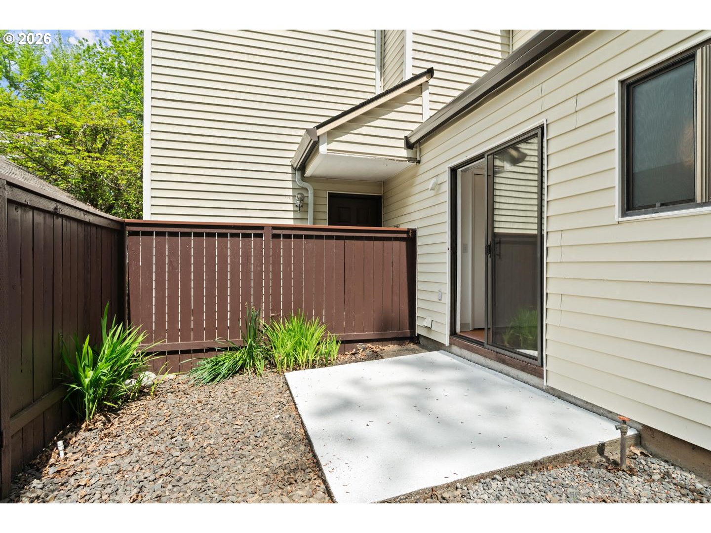 5792 Southwest 204th Place Beaverton, OR 97078 - Photo 24 of 33 a view of a house with a backyard