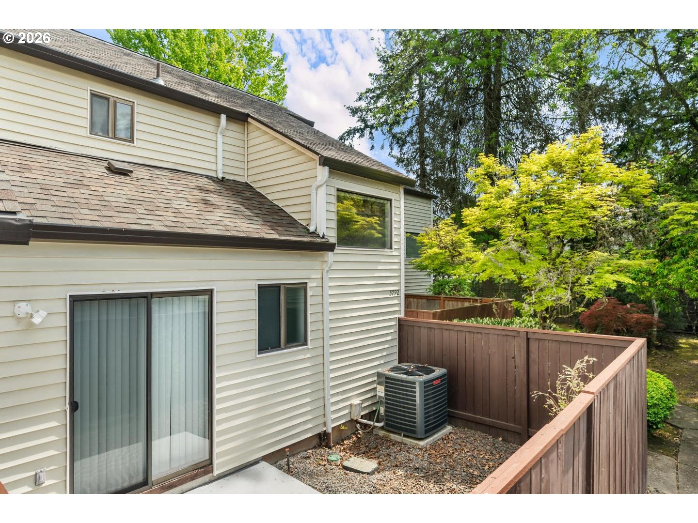 5792 Southwest 204th Place Beaverton, OR 97078 - Photo 28 of 33 a backyard of a house with a fountain